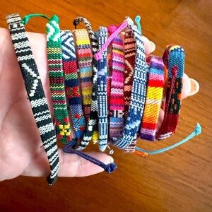 Lot of string style bracelets unisex multicolor one size fits most